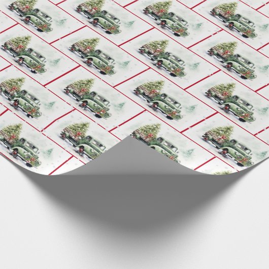 Retro-grüner LKW in Schneeflocken Geschenkpapier (Ecke)