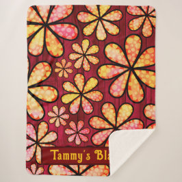 Retro Hippie Blume Power mit Hintergrund aus Rotem Sherpadecke