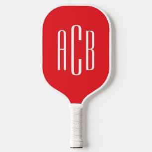 Retro-Karo mit einem roten und einem weißen, dreib Pickleball Schläger