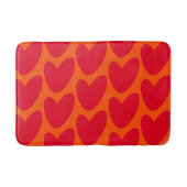 Retro Orange mit Groovy Red Hearts Badematte (Vorderseite)