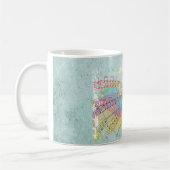 Retro-Regenbogen und Musiknoten auf einer Shabby-T Kaffeetasse (Links)