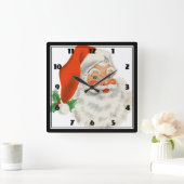 Retro Santa Claus and Holly Quadratische Wanduhr (Zuhause)