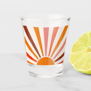Retro-Sonnenstrahlen platzen Sonnenuntergang Orang Schnapsglas