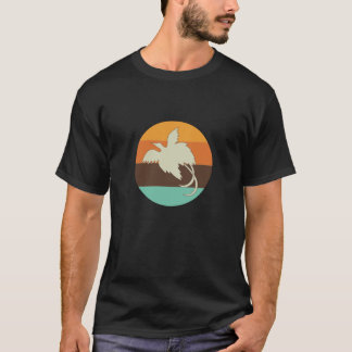 Retro-Vogel des Paradieses mit Sonnenuntergang T-Shirt