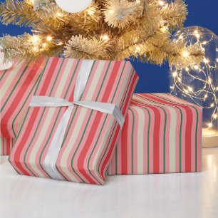 Retro-Weihnachtsstreifenmuster Rosa im altmodische Geschenkpapier