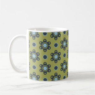 Retroblaue und schwarze Gänseblümchen auf grünem B Kaffeetasse
