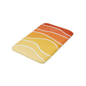 Retrowelle in Gelb und Orange Badematte (Schrägansicht)