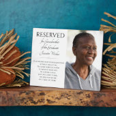 Rett einer Großmutter am Lehrstuhl Fotoplatte (Seite)