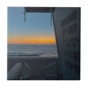 Rettungsschwimmer Turm bei Sonnenuntergang Fliese