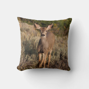 Reversible Fauna auf einem Kissen