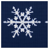 Rieseneis-Crystal-Schneeflocken auf Dunklem Indigo Stoff (Nahaufnahme)