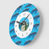 Ringe der Delphine, Große Wanduhr (Winkel)