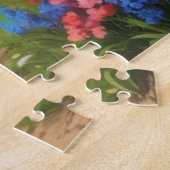 road leading to the village with mountains in the puzzle (Seite)