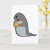 Robbe beim Essen mit Burger Karte (Gelbe Blume)