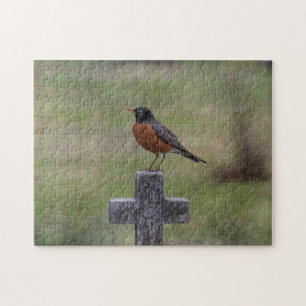 Robin auf einem Kreuz Puzzle