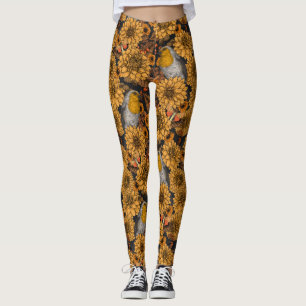Robinen im Herbstgarten auf schwarz Leggings