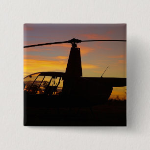 Robinson R44 Hubschrauber bei Sonnenuntergang Button