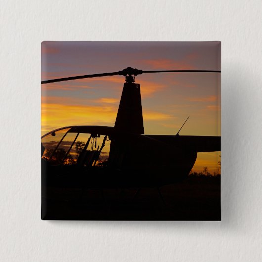 Robinson R44 Hubschrauber bei Sonnenuntergang Button (Vorderseite)