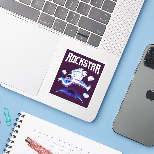 Rockstar-Astronautin spielt Gitarre im Weltraumauf Aufkleber (Laptop mit iPhone)