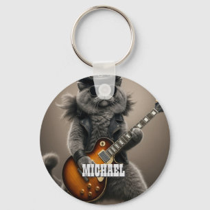 Rockstar-Katze spielt elektrische Gitarre in Leder Schlüsselanhänger