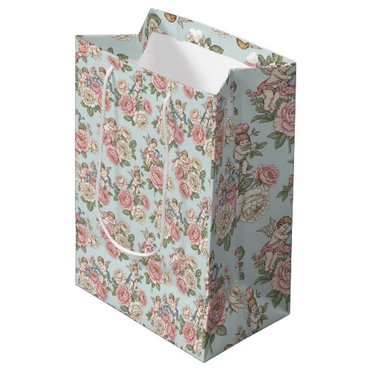 Rococo Revival Cherub Floral Toile Wrapping Paper Mittlere Geschenktüte (Vorderseite Schrägansicht)