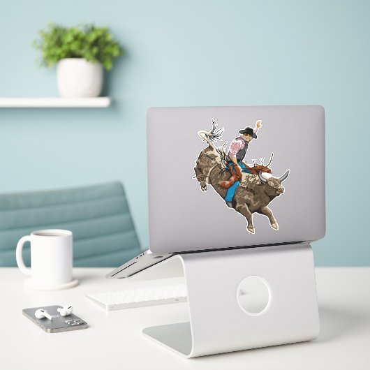 Rodeo-Bullenreiter Aufkleber (Laptop auf Schreibtisch)