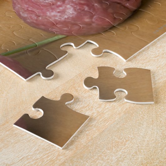 Rohe Fleischbällchen auf einem Schneidebrett Puzzle (Seite)