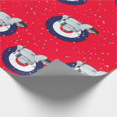 Roller auf roter Verpackung mit fallendem Schnee Geschenkpapier (Ecke)