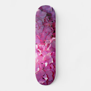 Romantische rosa, blumengeschmückte, elegante Hydr Skateboard