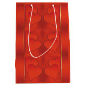Romantisches rotes strahlendes Herzmuster Mittlere Geschenktüte (Vorderseite)