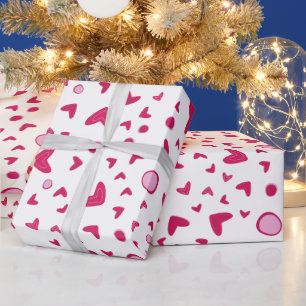Romantisches Talentinherzen beim Greifen Geschenkpapier