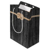 Rope Knot on black wood Medium Gift Bag Mittlere Geschenktüte (Rückseite Schrägansicht)
