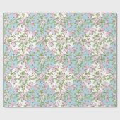 Rosa Blossom auf dem Patchwork der blauen und weiß Geschenkpapier (Flach)