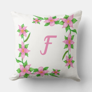 Rosa Blume auf den rosafarbenen Monogram-Kissen Kissen