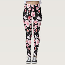 Rosa Blume-Muster über Schwarz Leggings