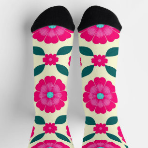 Rosa Blüten mit blauen Zentren und grünen Blättern Socken