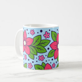 Rosa Blüten mit kräftigen Blütenblättern und grüne Kaffeetasse