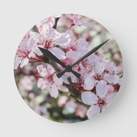 Rosa Blüten roten Stiele. Runde Wanduhr (Vorderseite)