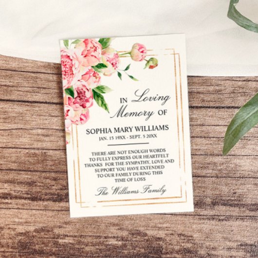 Rosa Blütengeflecht und grünes Beileid dank Karte