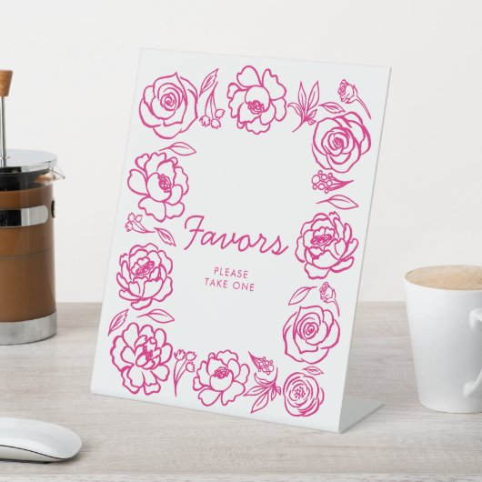 Rosa Blütenhandzeichen Sockelschild (In SItu)