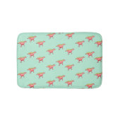 Rosa Dinosaurier-Muster auf blass blau Badematte (Vorderseite)
