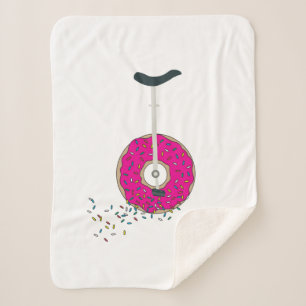 Rosa Donut Wheel Einrad mit farbenfrohen Sprinklen Sherpadecke