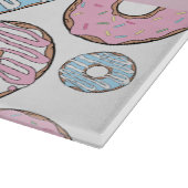 Rosa Donuts, blaue Donuts, Sprinklen, Ihr Name Schneidebrett (Ecke)