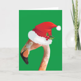 Rosa Flamingo in einer roten Weihnachtsmannmütze Feiertagskarte