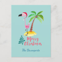Rosa Flamingo in einer Weihnachtsmannmütze mit Pal