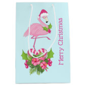 Rosa Flamingo in Weihnachtsmannmütze mit Candy Can Mittlere Geschenktüte (Vorderseite)