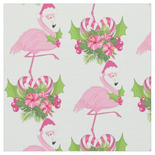 Rosa Flamingo in Weihnachtsmannmütze mit Candy Can Stoff (Nahaufnahme)