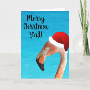 Rosa Flamingo mit roter Cartoon-Santa-Mütze Feiertagskarte
