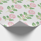 Rosa Gänseblümchen und Weihnachts-Wrap-Papier mit  Geschenkpapier (Ecke)
