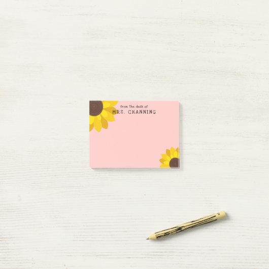 Rosa gelbe Sonnenblumen vom Schreibtisch des Lehre Post-it Klebezettel (Auf Schreibtisch)